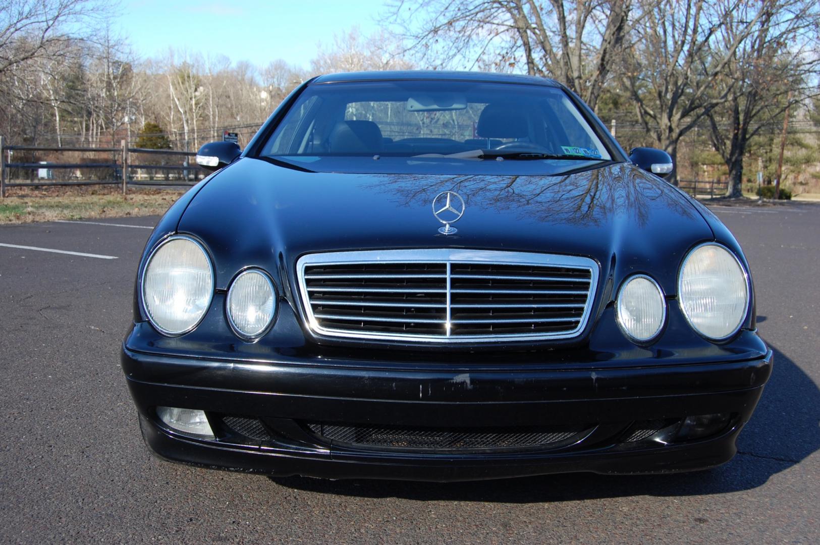 2000 Black /Black Mercedes-Benz CLK-Class (WDBLJ65G3YF) with an 3.2 Liter engine, Automatic transmission, located at 6528 Lower York Road, New Hope, PA, 18938, (215) 862-9555, 40.358707, -74.977882 - Here is a good looking, good running 2000 Mercedes Benz CLK 320 Coupe. 3.2 Liter V6 engine, auto trans, keyless entry, power moonroof, windows, mirrors, central locking system, rear sun shade, dual power seats in leather, AM/FM/6 disc CD in trunk, alloy wheels, 4 good tires . Only 90k original mi - Photo#6